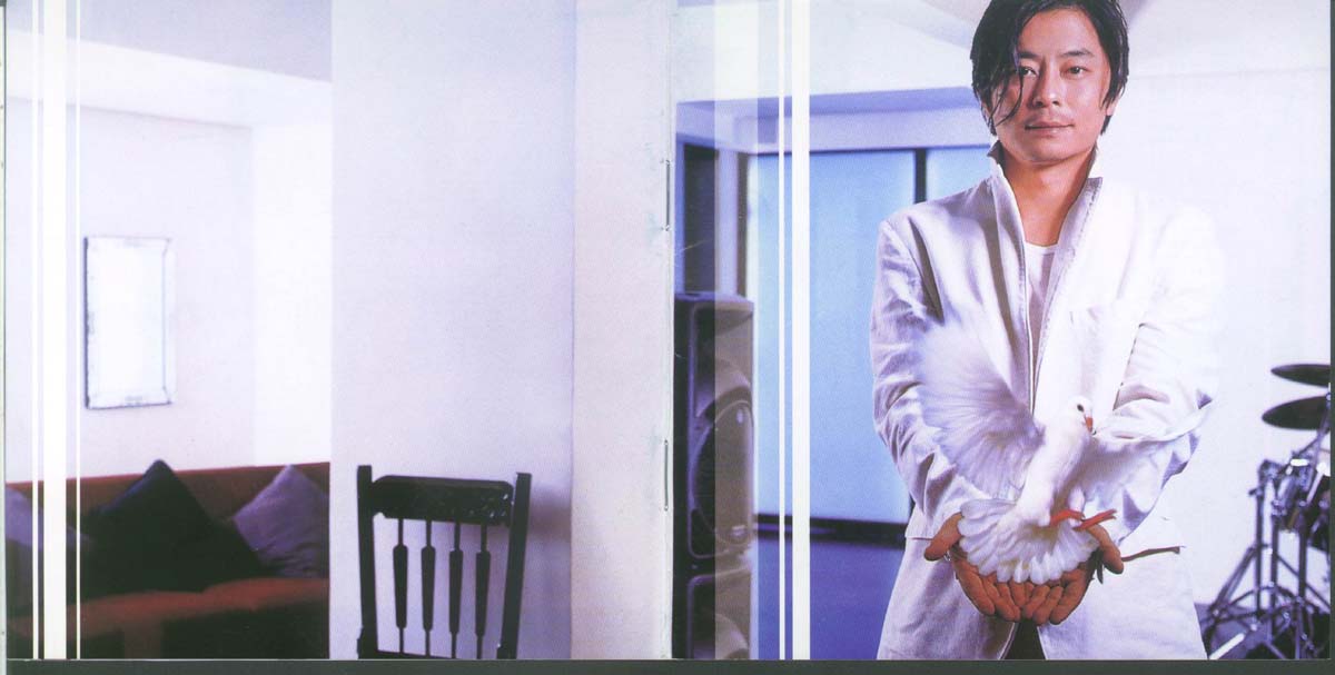 爱与梦（2002年发行第11张粤语专辑）
